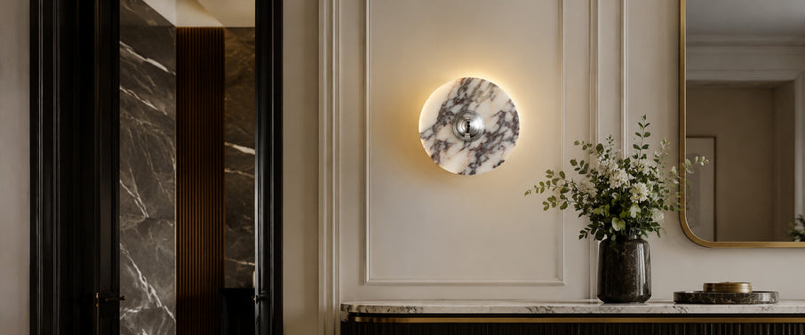 Elegant Calacatta marble wall light mounted on a textured background.