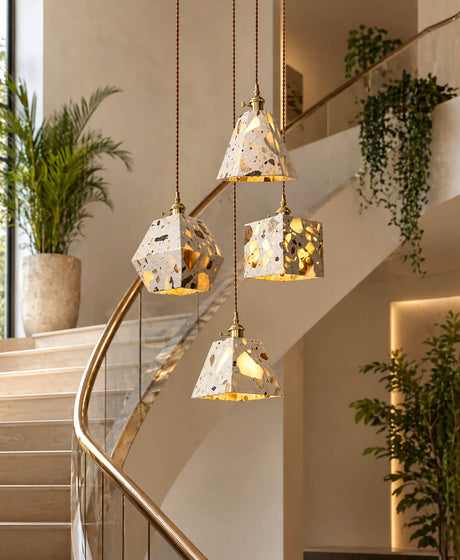 The stairwell features a terrazzo-finished chandelier, which brightens up the staircase.